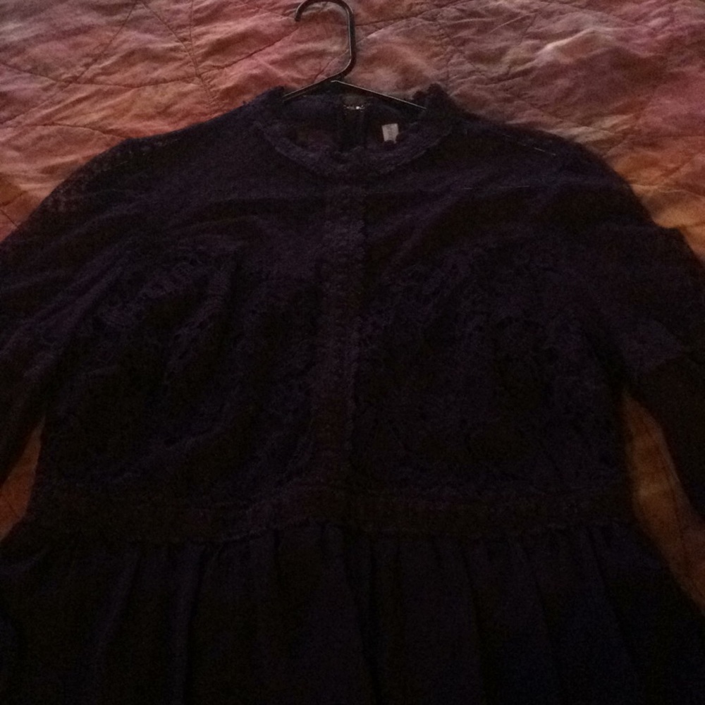 Plum long sheer sleeved, high neck, mid length.